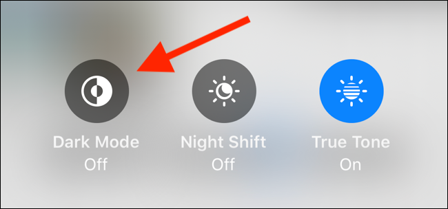Tap on Dark Mode toggle in Brightness slider to enable dark mode