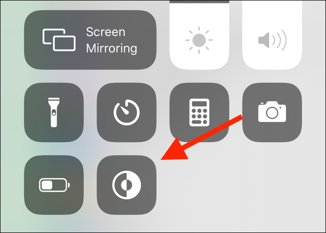 Tap on the new Dark Mode control in Control Center to quickly toggle the dark mode