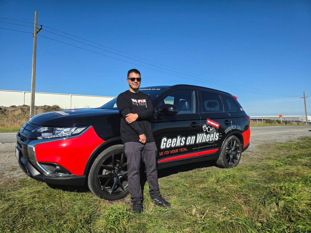 Alejandro with a Geeks on Wheels Car